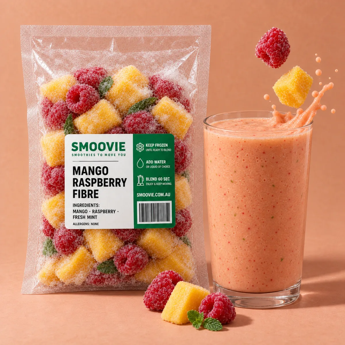 A frozen Smoovie mango and raspberry pack beside a blended smoothie